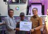 Bupati Kolaka Serahkan Combine Harvester untuk Petani Desa Awa, Tegaskan Komitmen Tingkatkan Produktivitas Pertanian dan Pelayanan Sosial